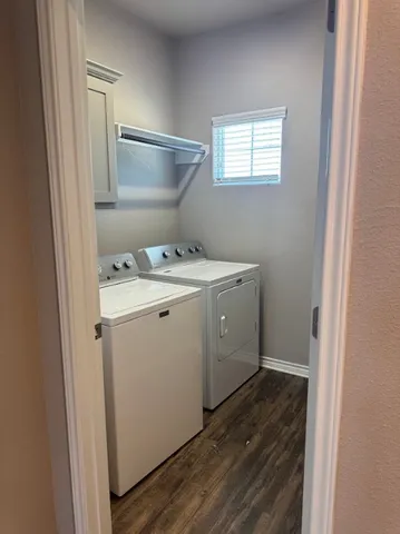 a utility room with dryer and washer