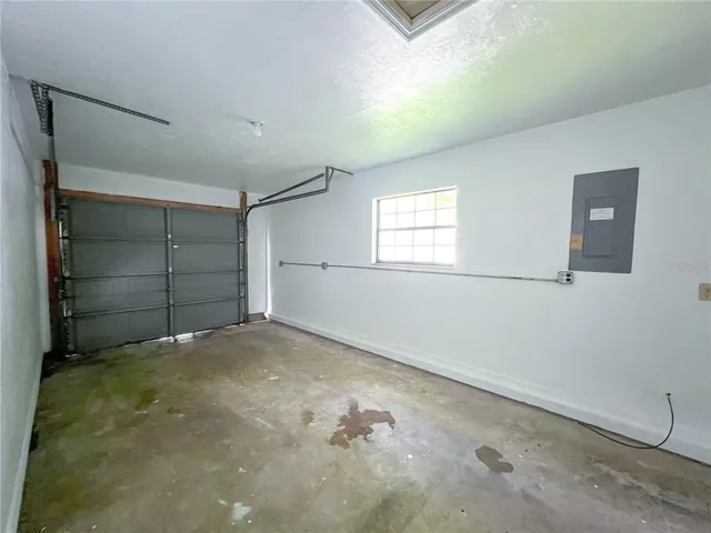 a view of empty room with windows