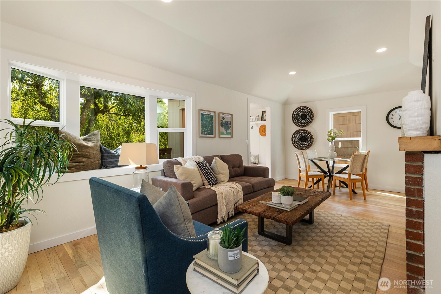 6031 McKinley Place North Seattle, WA 98103 - Photo 11 of 40 a living room with furniture and a large window