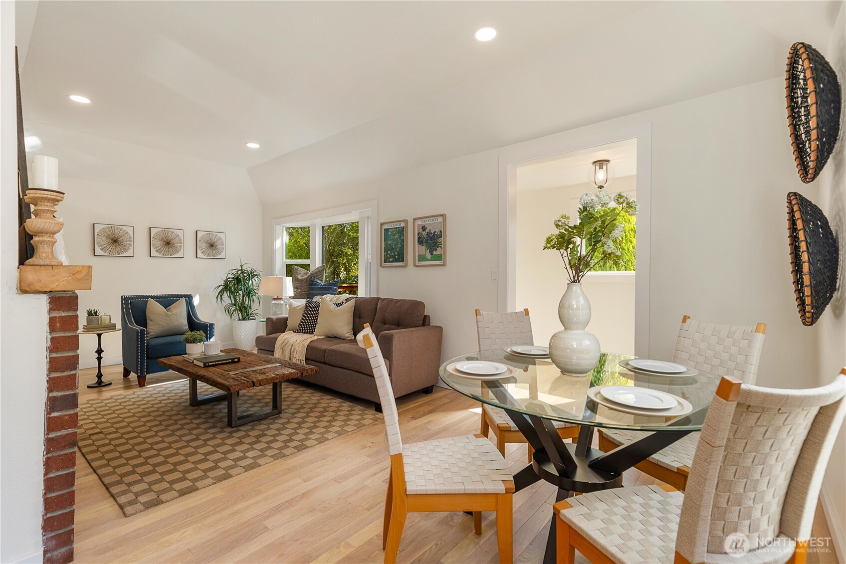 6031 McKinley Place North Seattle, WA 98103 - Photo 12 of 40 a living room with furniture and a table