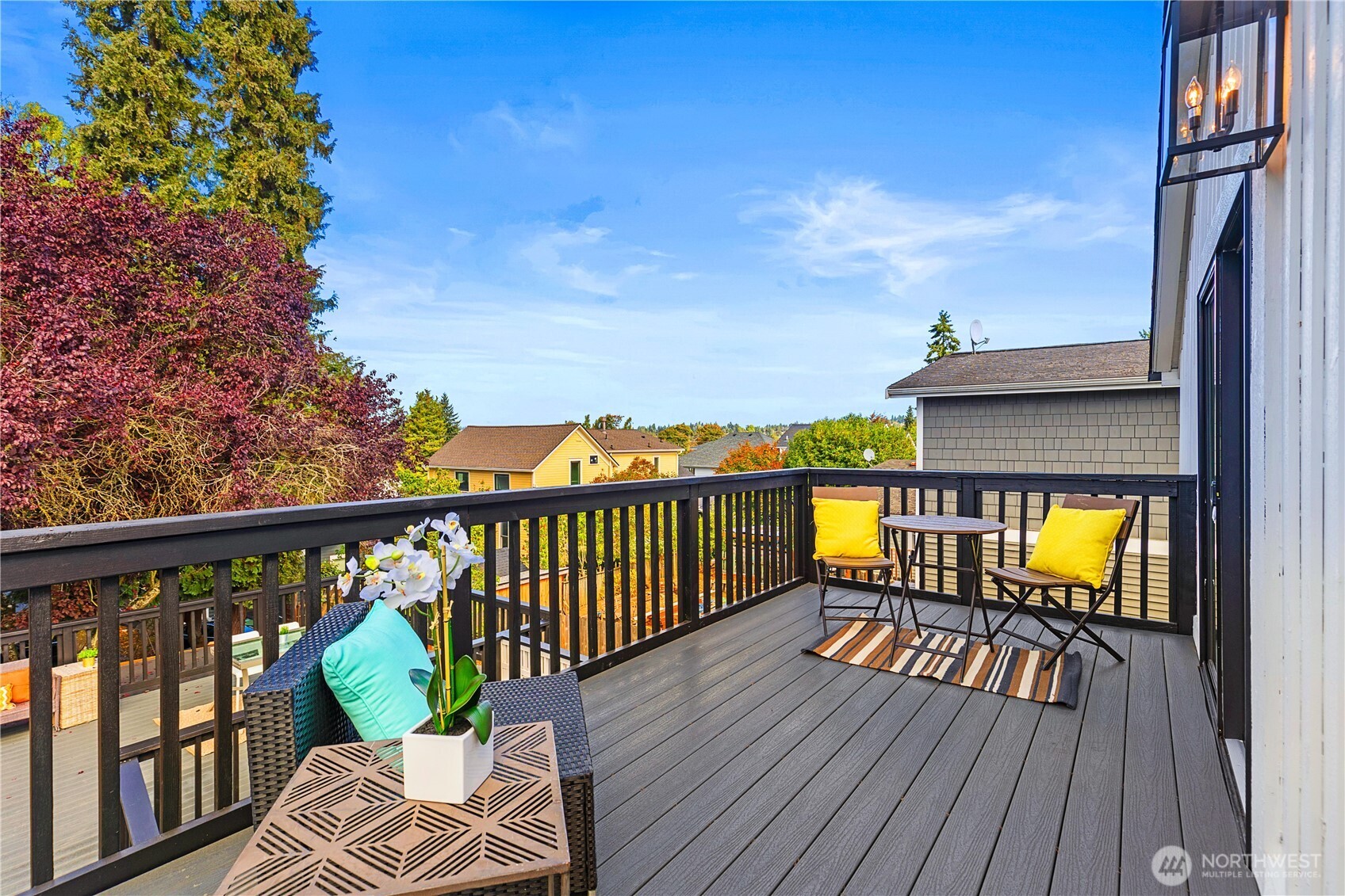 6031 McKinley Place North Seattle, WA 98103 - Photo 28 of 40 a view of a balcony with chairs