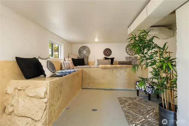 a dining room with furniture and window