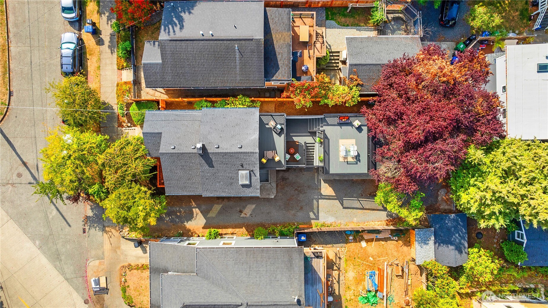 6031 McKinley Place North Seattle, WA 98103 - Photo 6 of 40 an aerial view of residential houses with outdoor space