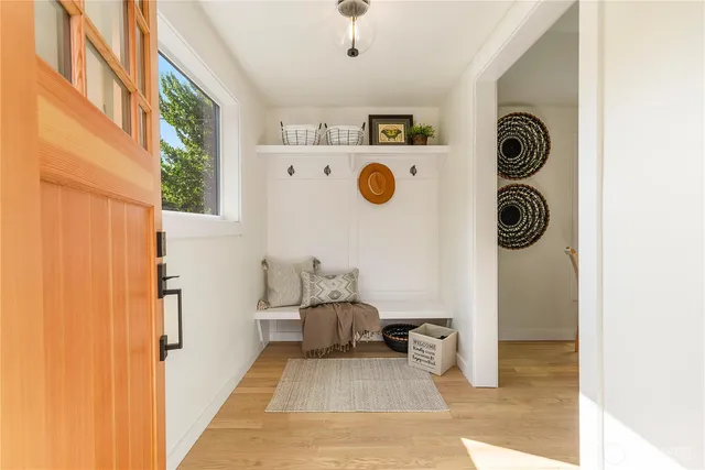 a view of living room with furniture and window