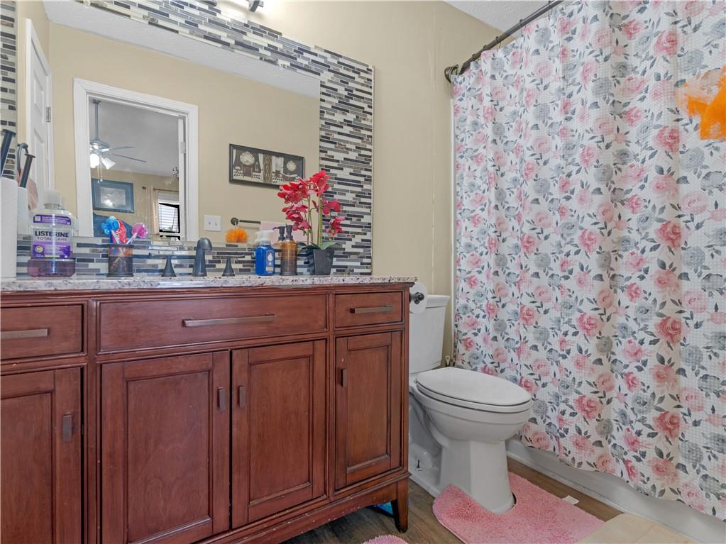 103 Oak Circle South Stockbridge, GA 30281 - Photo 11 of 11 a bathroom with a sink and a toilet