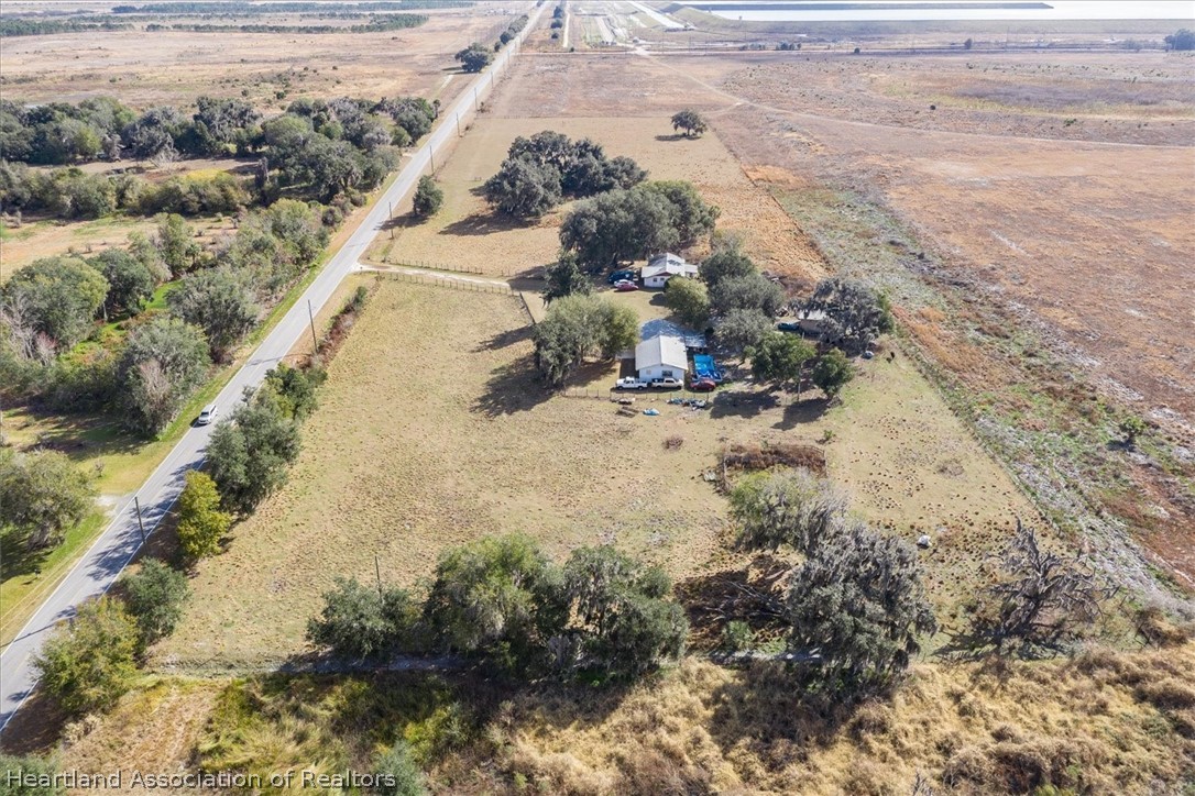 2364 County Line Road Bowling Green, FL 33834 - Photo 24 of 24 a view of a yard with wooden floor