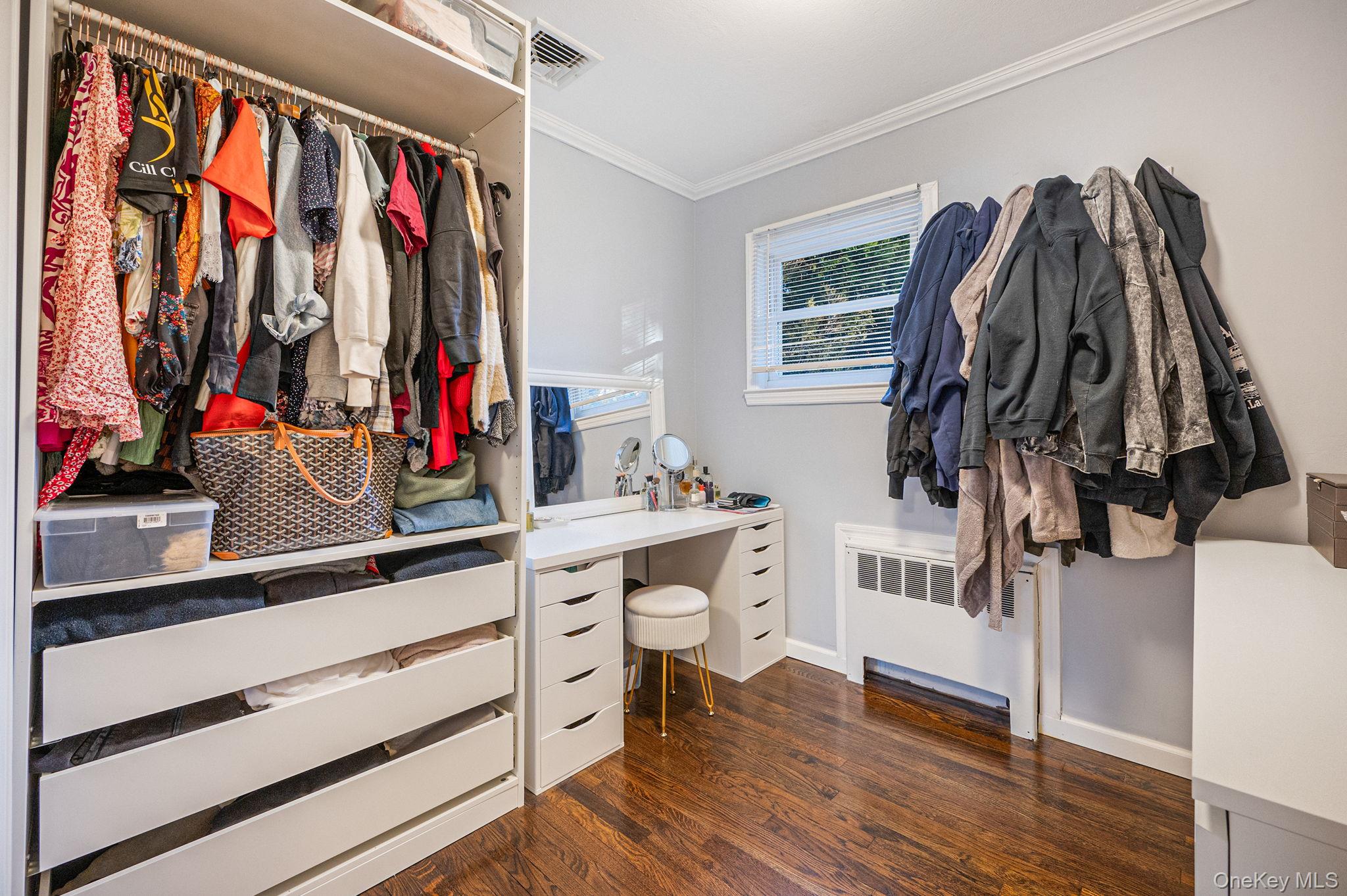 792 Frankford Road West Babylon, NY 11704 - Photo 21 of 39 a view of walk in closet with clothes and shoes