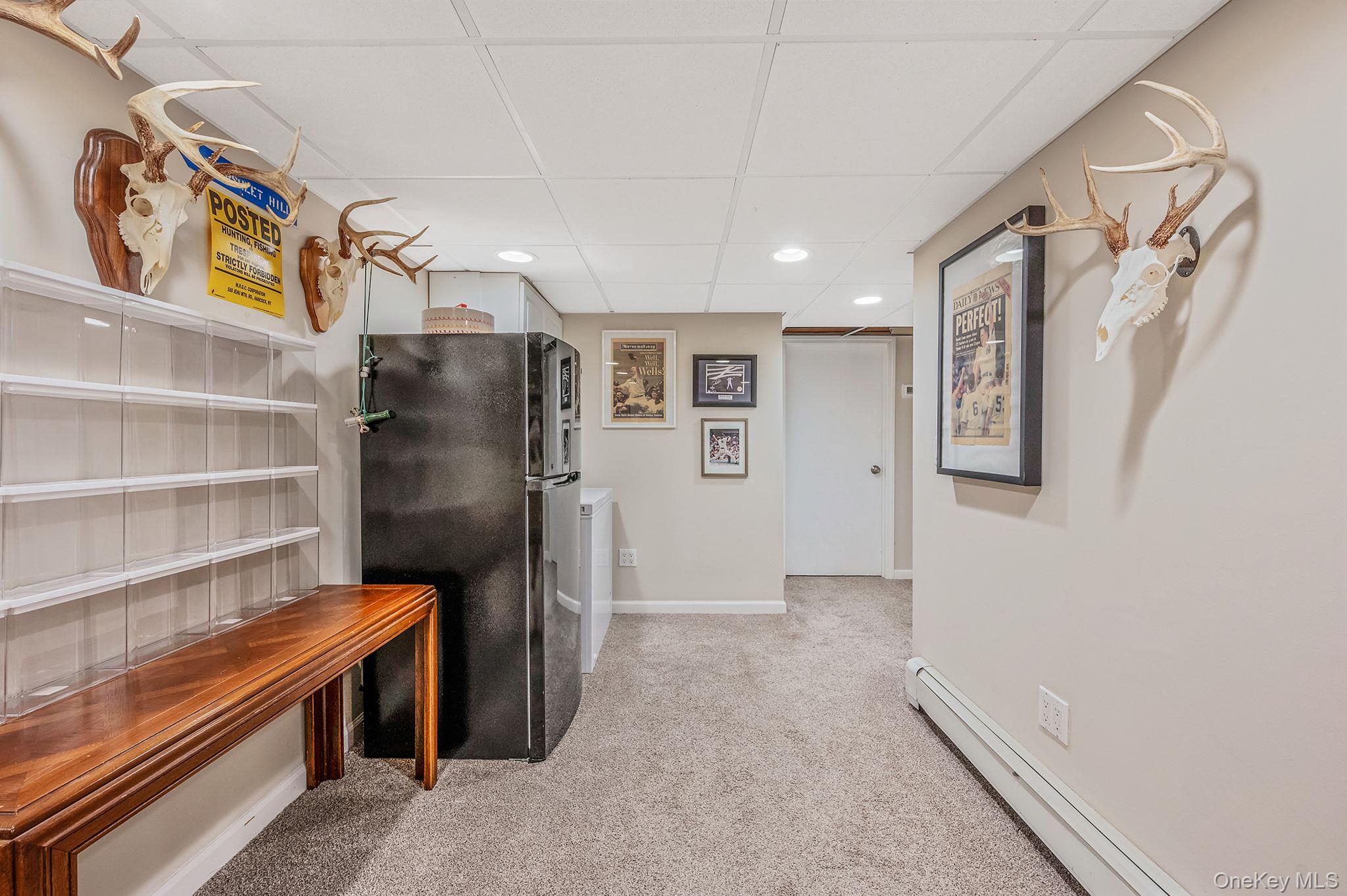 792 Frankford Road West Babylon, NY 11704 - Photo 28 of 39 a view of walk in closet with clothes and shoes