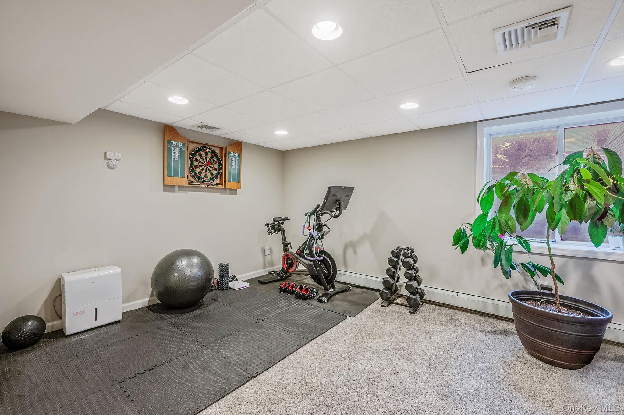 792 Frankford Road West Babylon, NY 11704 - Photo 33 of 39 a view of a room with gym equipment