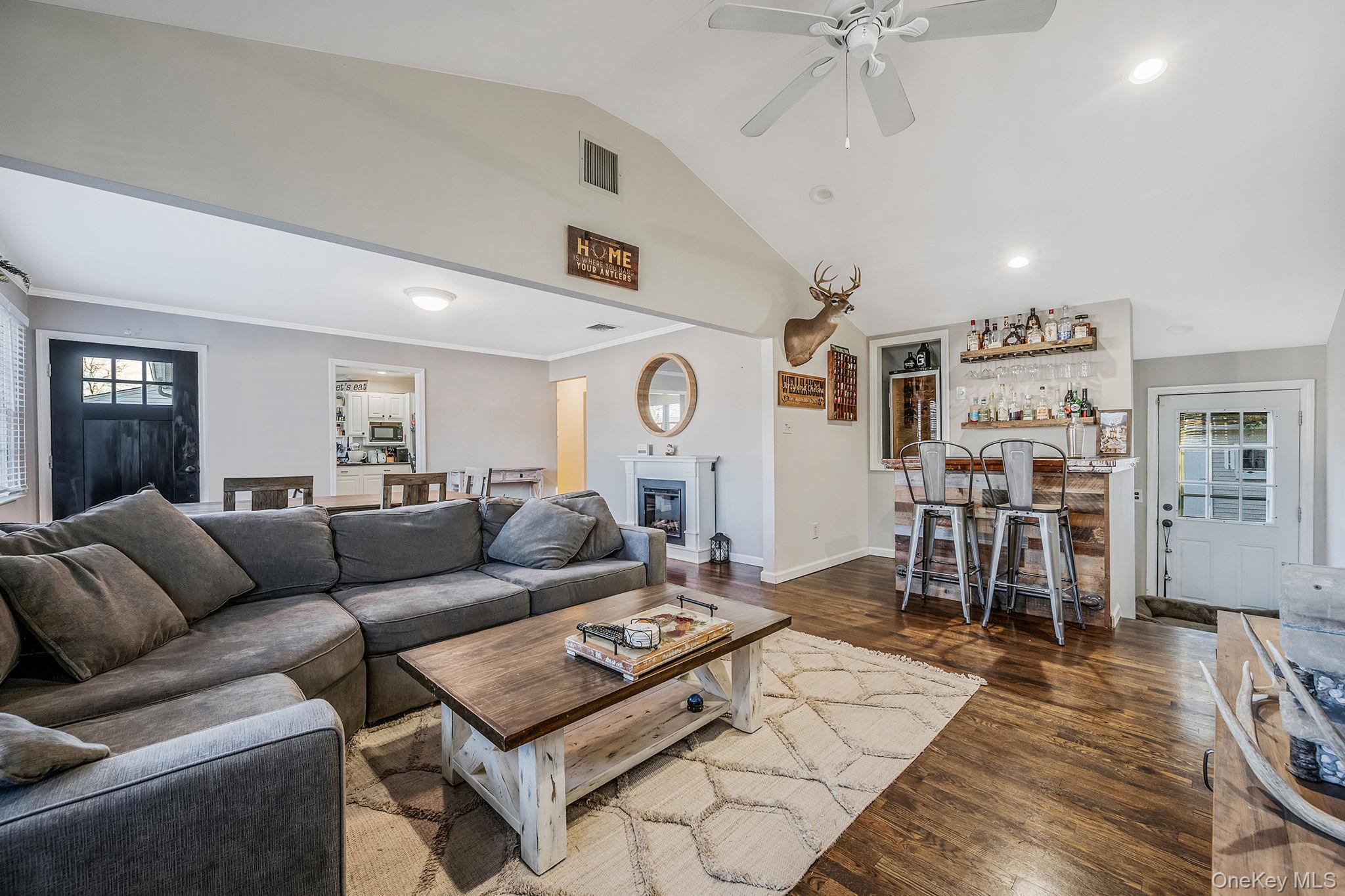 792 Frankford Road West Babylon, NY 11704 - Photo 10 of 39 a living room with furniture and wooden floor