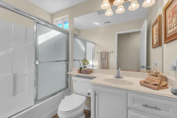 a view of storage and utility room with washer and dryer