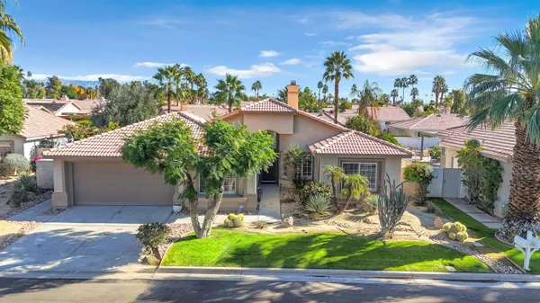 a view of a city with a lake