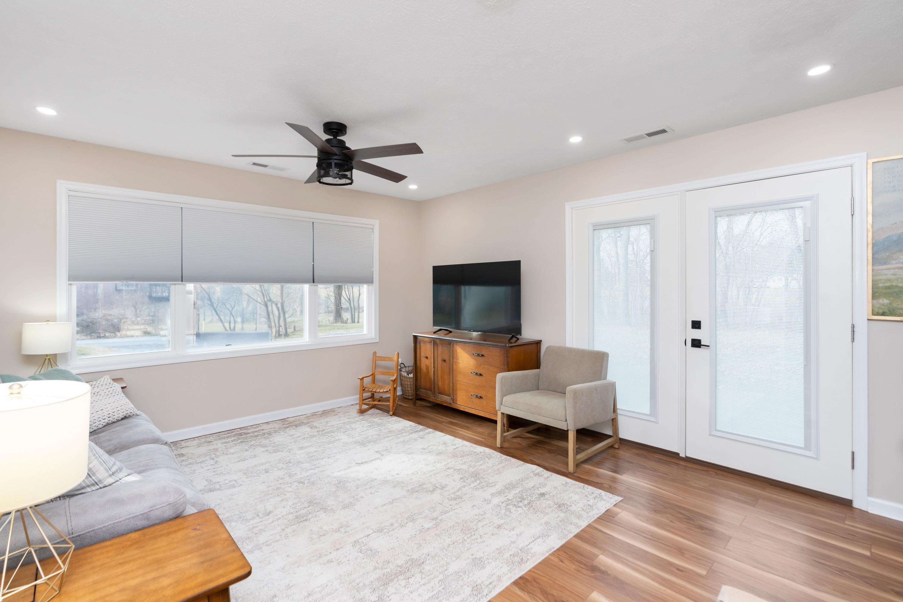 331 Stone Branch Road Staunton, VA 24401 - Photo 17 of 75 a living room with furniture and a flat screen tv
