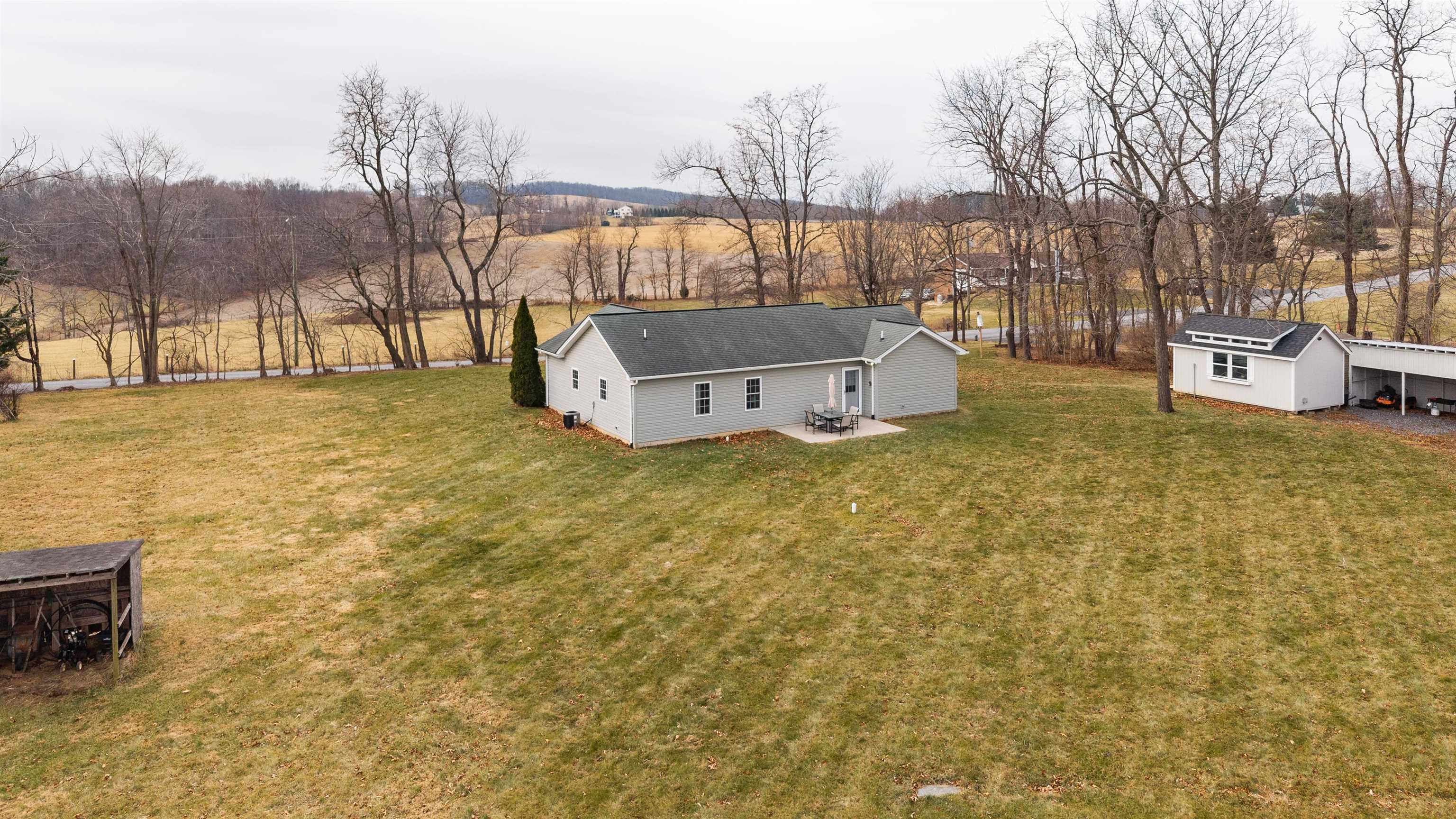 331 Stone Branch Road Staunton, VA 24401 - Photo 45 of 75 a view of a backyard with large trees