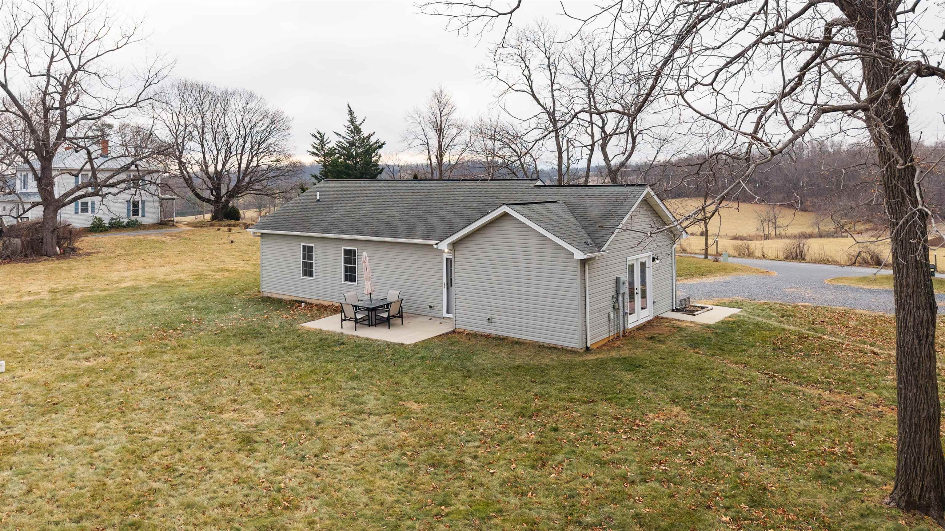 331 Stone Branch Road Staunton, VA 24401 - Photo 50 of 75 a view of a house with a yard covered with snow in the background