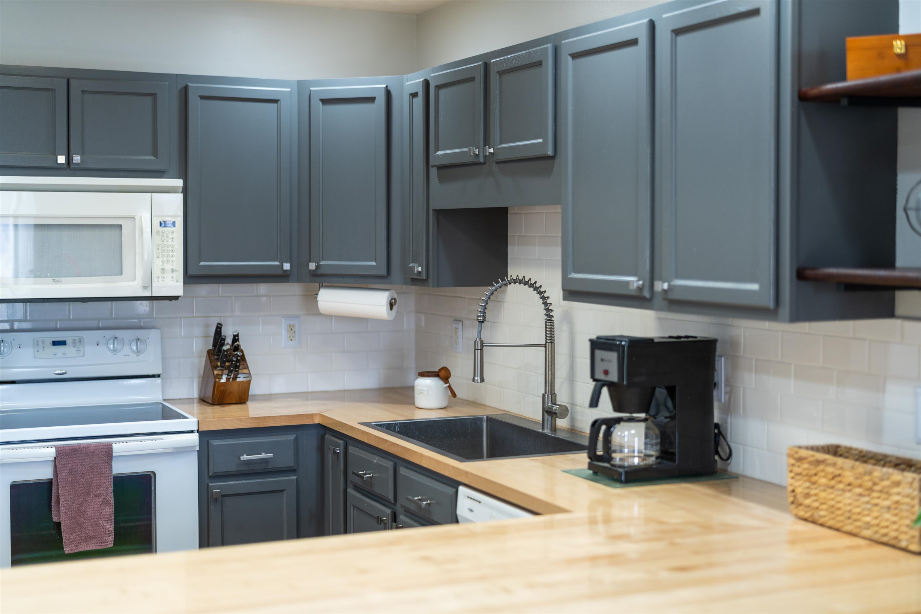 331 Stone Branch Road Staunton, VA 24401 - Photo 63 of 75 a kitchen with stainless steel appliances granite countertop a sink stove and cabinets