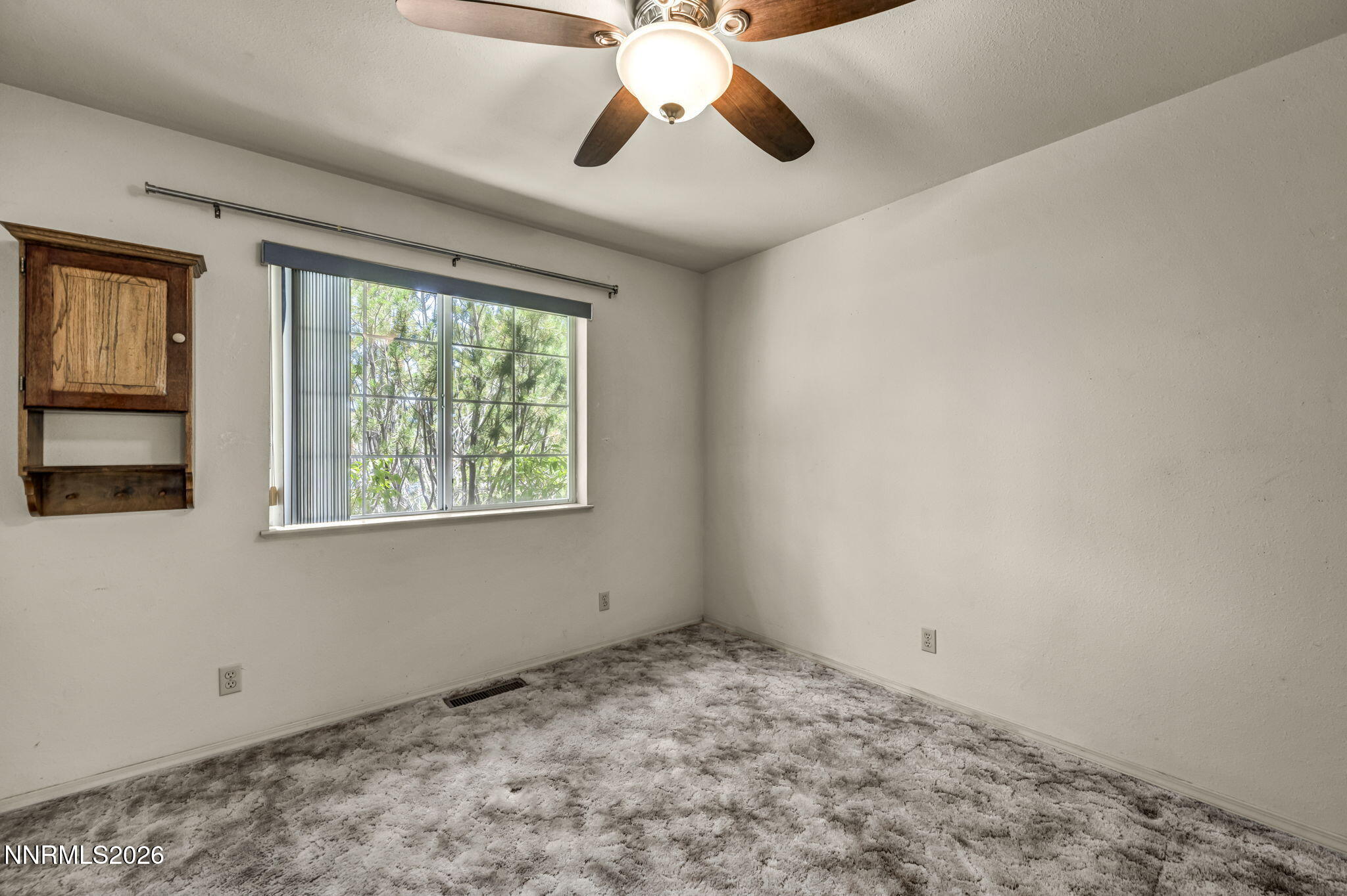 692 Lassen Way Gardnerville, NV 89460 - Photo 21 of 34 a view of room with window and ceiling fan
