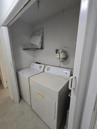 a kitchen with a stove and a refrigerator