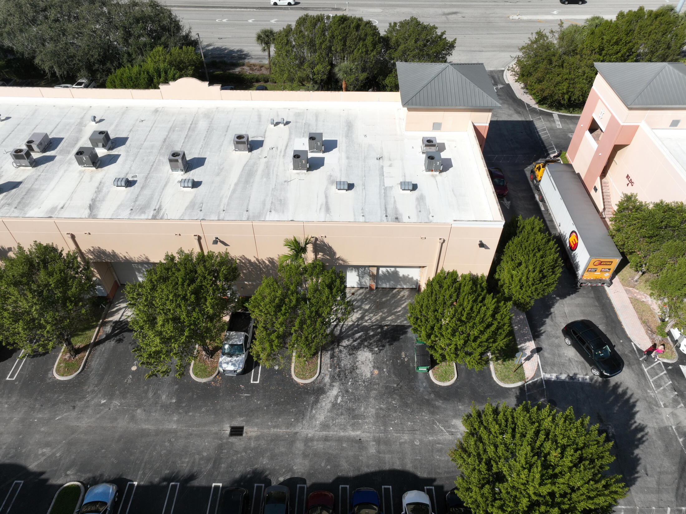 601 North Congress Avenue, Unit 101 Delray Beach, FL 33445 - Photo 11 of 13 601 101 102 rear aerial 2025