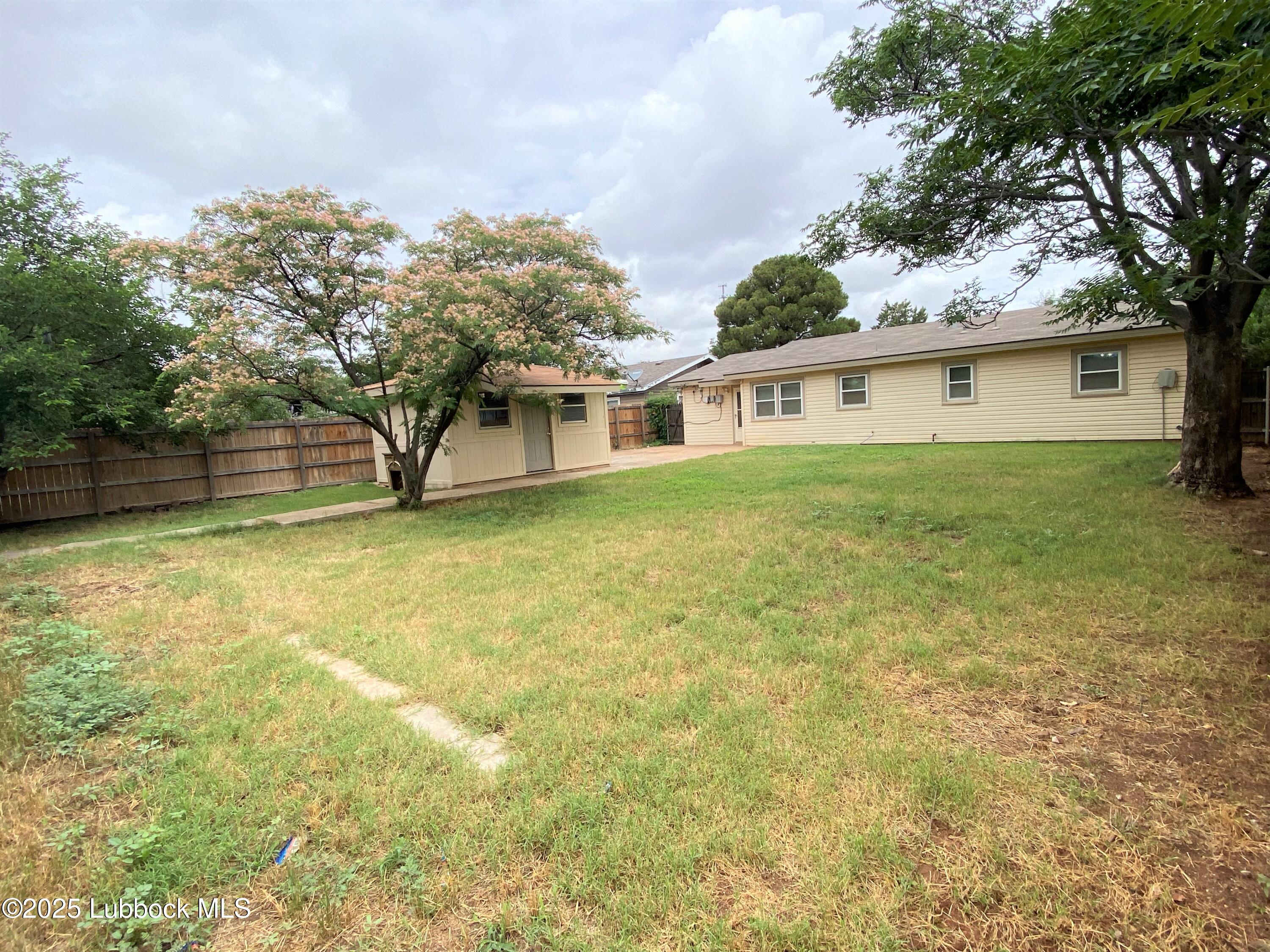 5207 39th Street Lubbock, TX 79414 - Photo 9 of 20 a house view with a outdoor space