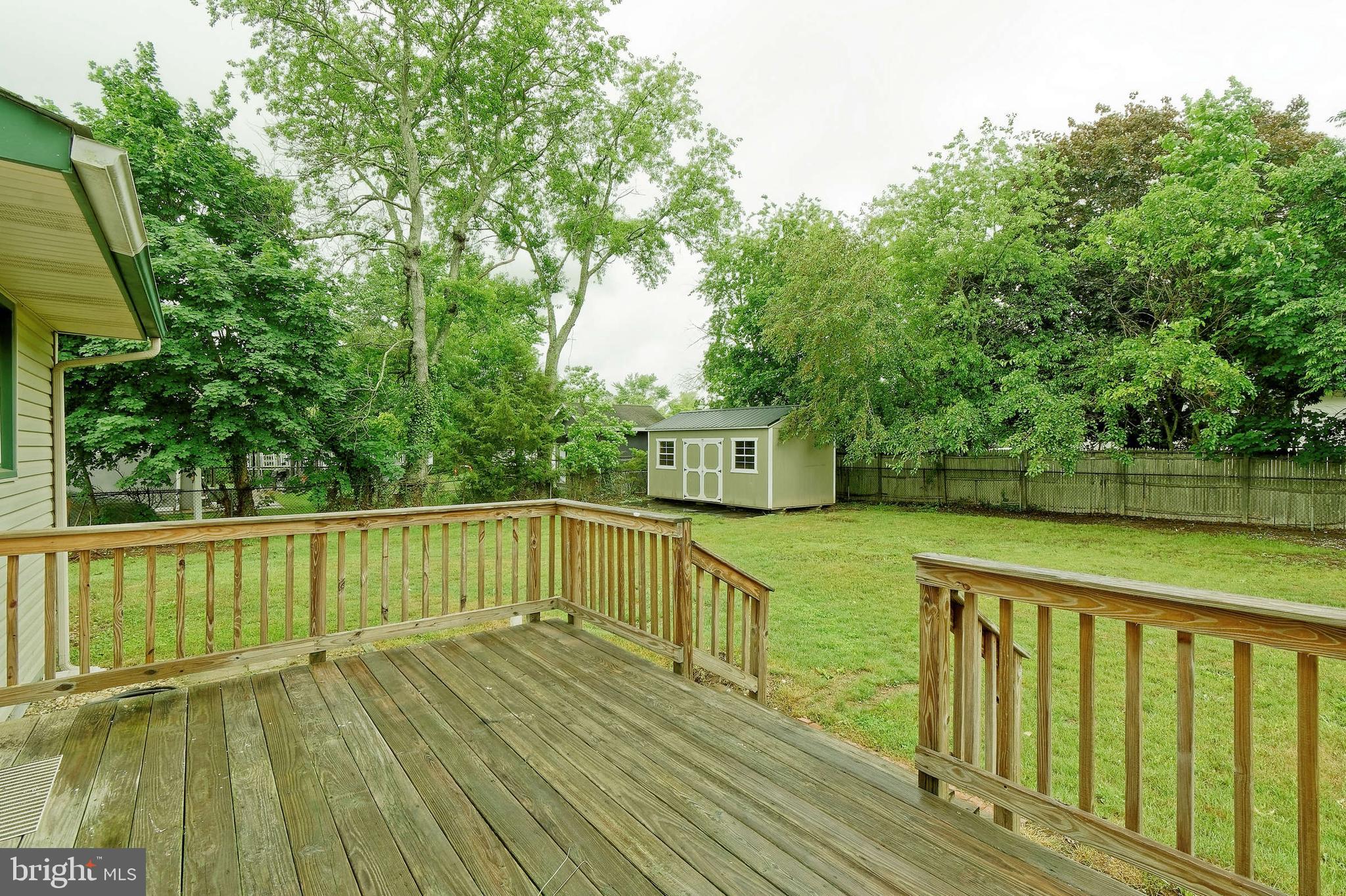 3176 Hance Bridge Road Vineland, NJ 08361 - Photo 14 of 24 a view of a balcony with wooden floor and fence