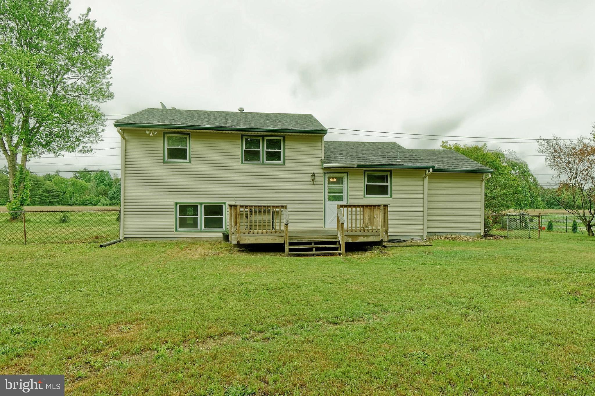 3176 Hance Bridge Road Vineland, NJ 08361 - Photo 20 of 24 a view of a house with a backyard