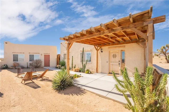 a kitchen with stainless steel appliances a stove and a sink
