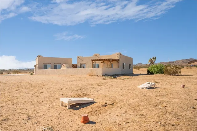 a view of a swimming pool with a lounge chair