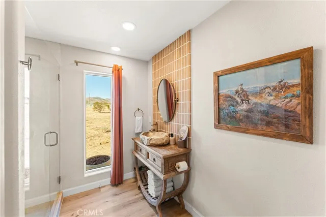 a view of a house with a snow in the yard