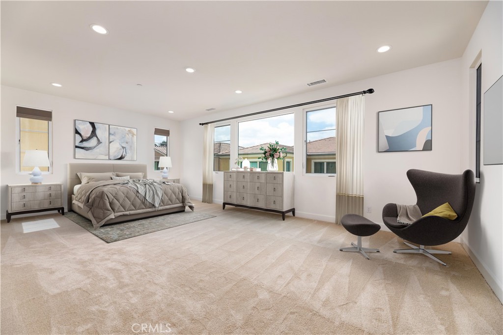 108 Coldwater Irvine, CA 92602 - Photo 11 of 36 a spacious bedroom with a bed and glass window