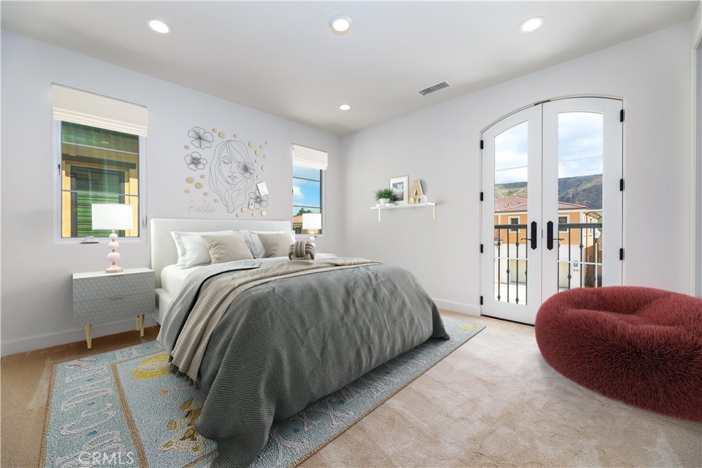 108 Coldwater Irvine, CA 92602 - Photo 16 of 36 a bedroom with a bed and wooden floor