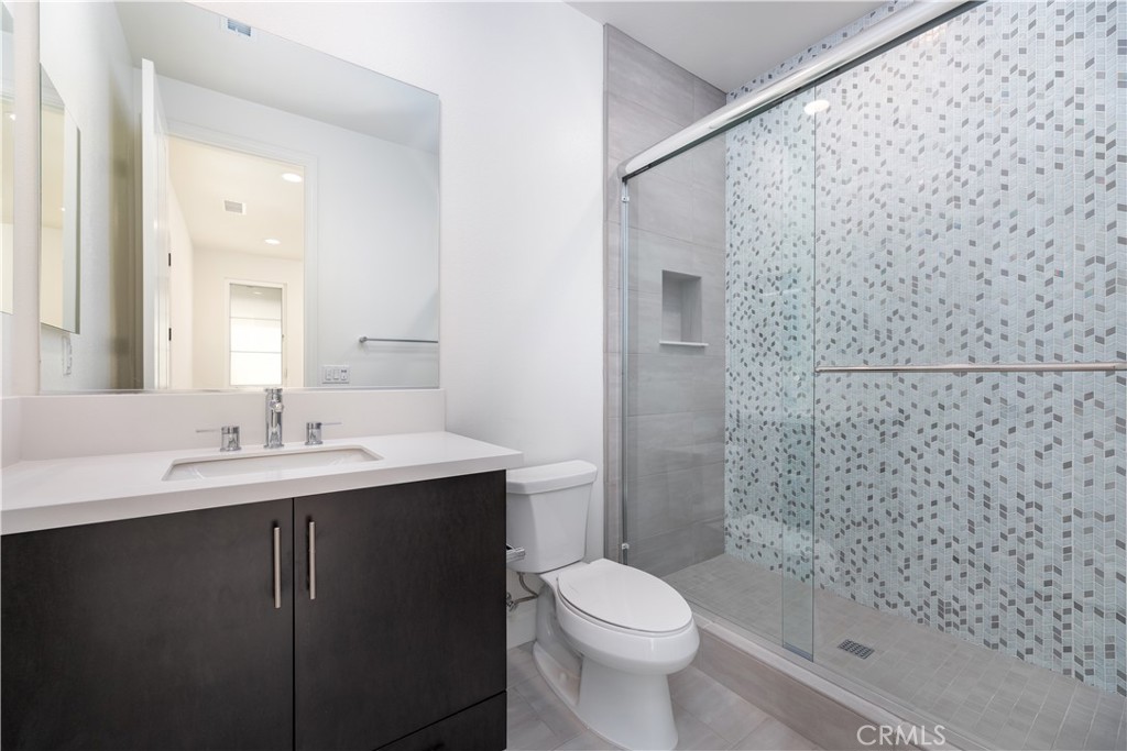 108 Coldwater Irvine, CA 92602 - Photo 4 of 36 a bathroom with a sink and a mirror