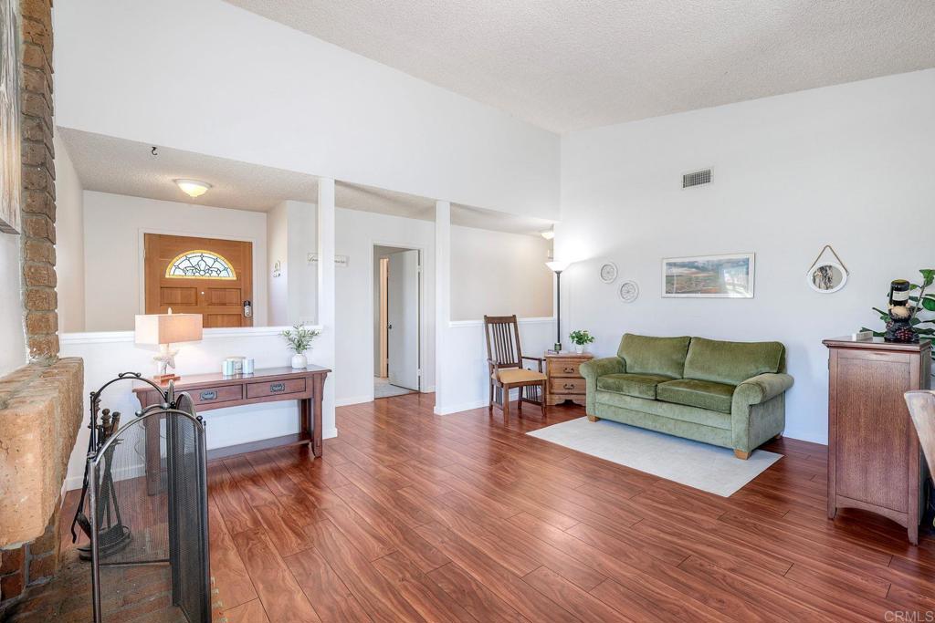 1114 Red Hawk Way San Marcos, CA 92078 - Photo 12 of 59 a living room with furniture and wooden floor