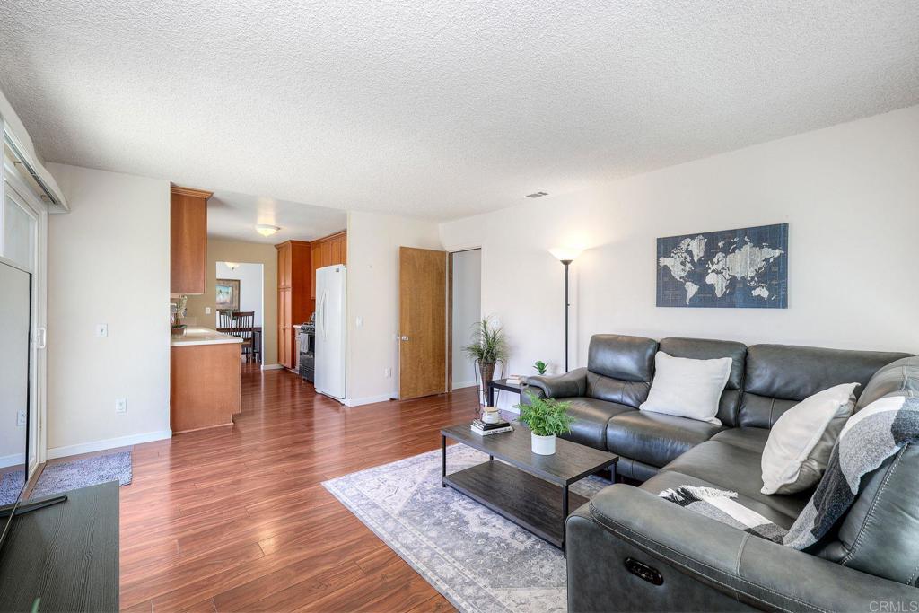 1114 Red Hawk Way San Marcos, CA 92078 - Photo 20 of 59 a living room with furniture and wooden floor
