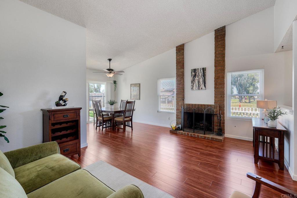 1114 Red Hawk Way San Marcos, CA 92078 - Photo 25 of 59 a living room with furniture and a fireplace