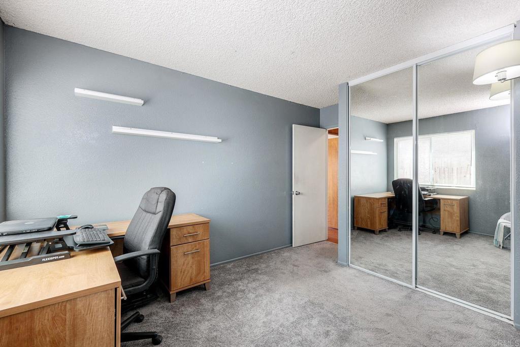 1114 Red Hawk Way San Marcos, CA 92078 - Photo 27 of 59 a view of a workspace with furniture and a window