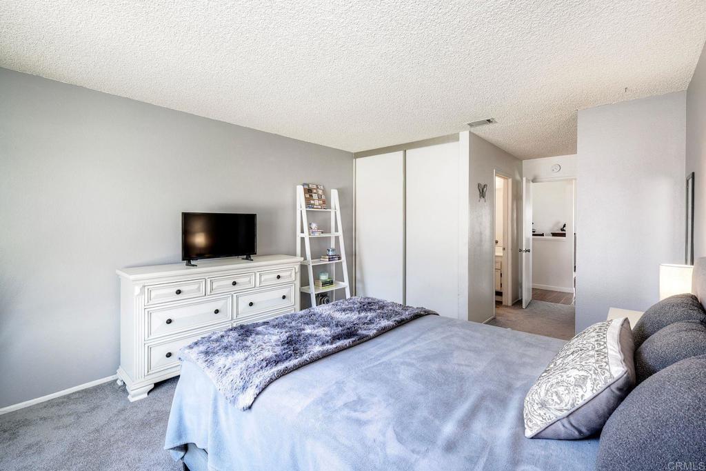 1114 Red Hawk Way San Marcos, CA 92078 - Photo 39 of 59 a bedroom with a bed and a television