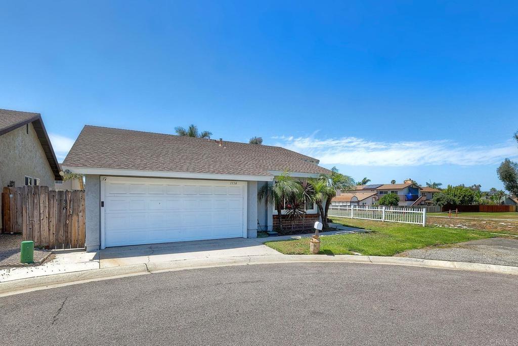 1114 Red Hawk Way San Marcos, CA 92078 - Photo 7 of 59 a house with a yard and a outdoor space