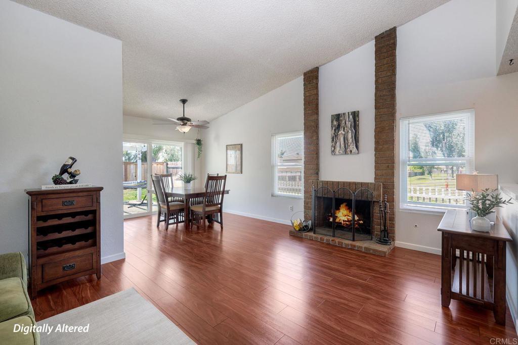 1114 Red Hawk Way San Marcos, CA 92078 - Photo 8 of 59 a living room with furniture and a fireplace