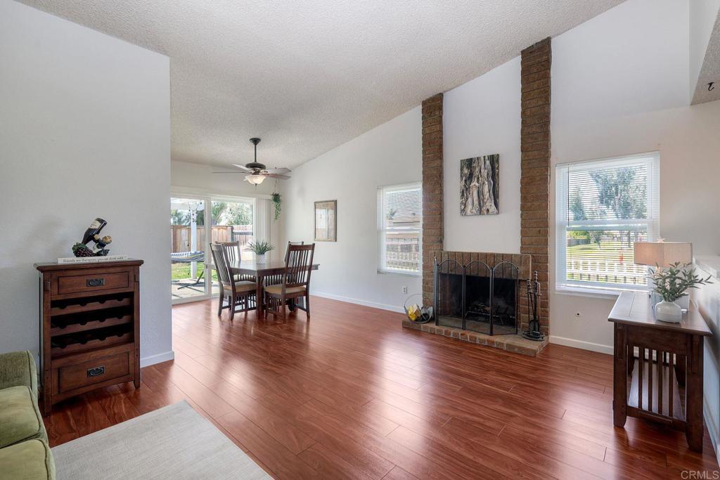 1114 Red Hawk Way San Marcos, CA 92078 - Photo 9 of 59 a living room with furniture and a fireplace