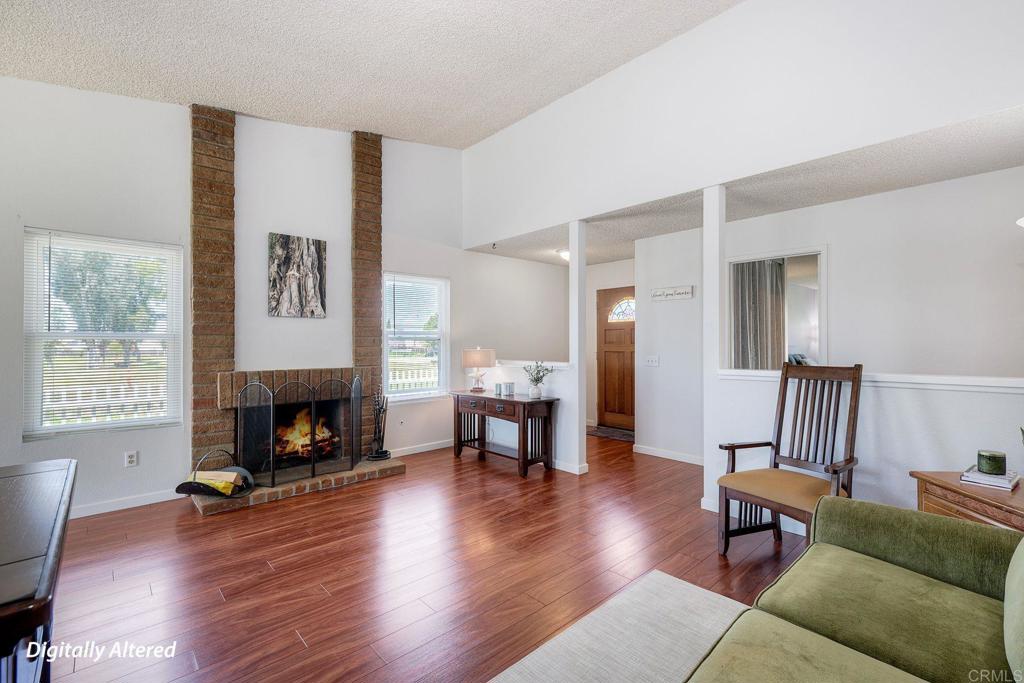 1114 Red Hawk Way San Marcos, CA 92078 - Photo 10 of 59 a living room with furniture and a fireplace