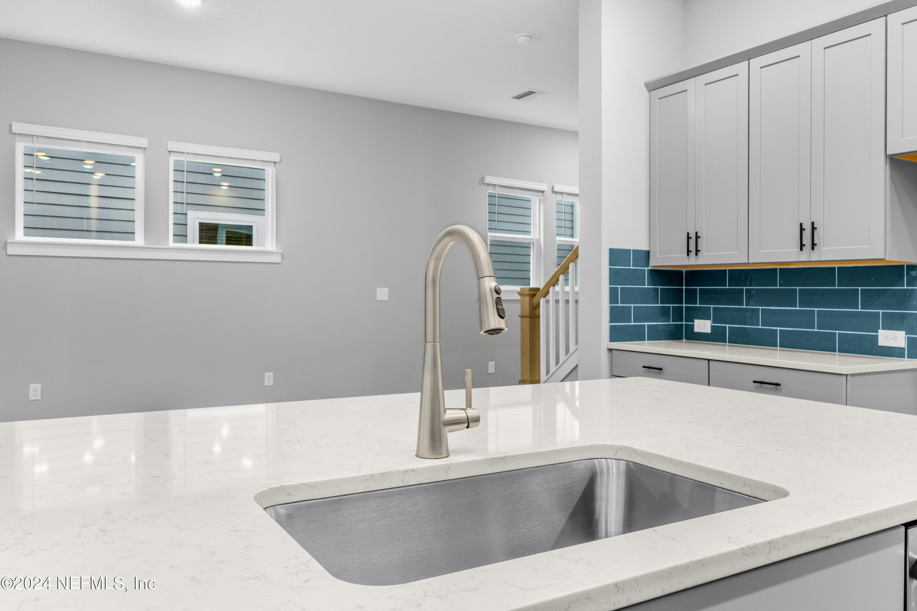 10021 Element Road Jacksonville, FL 32256 - Photo 6 of 18 a view of a sink a counter space and cabinets