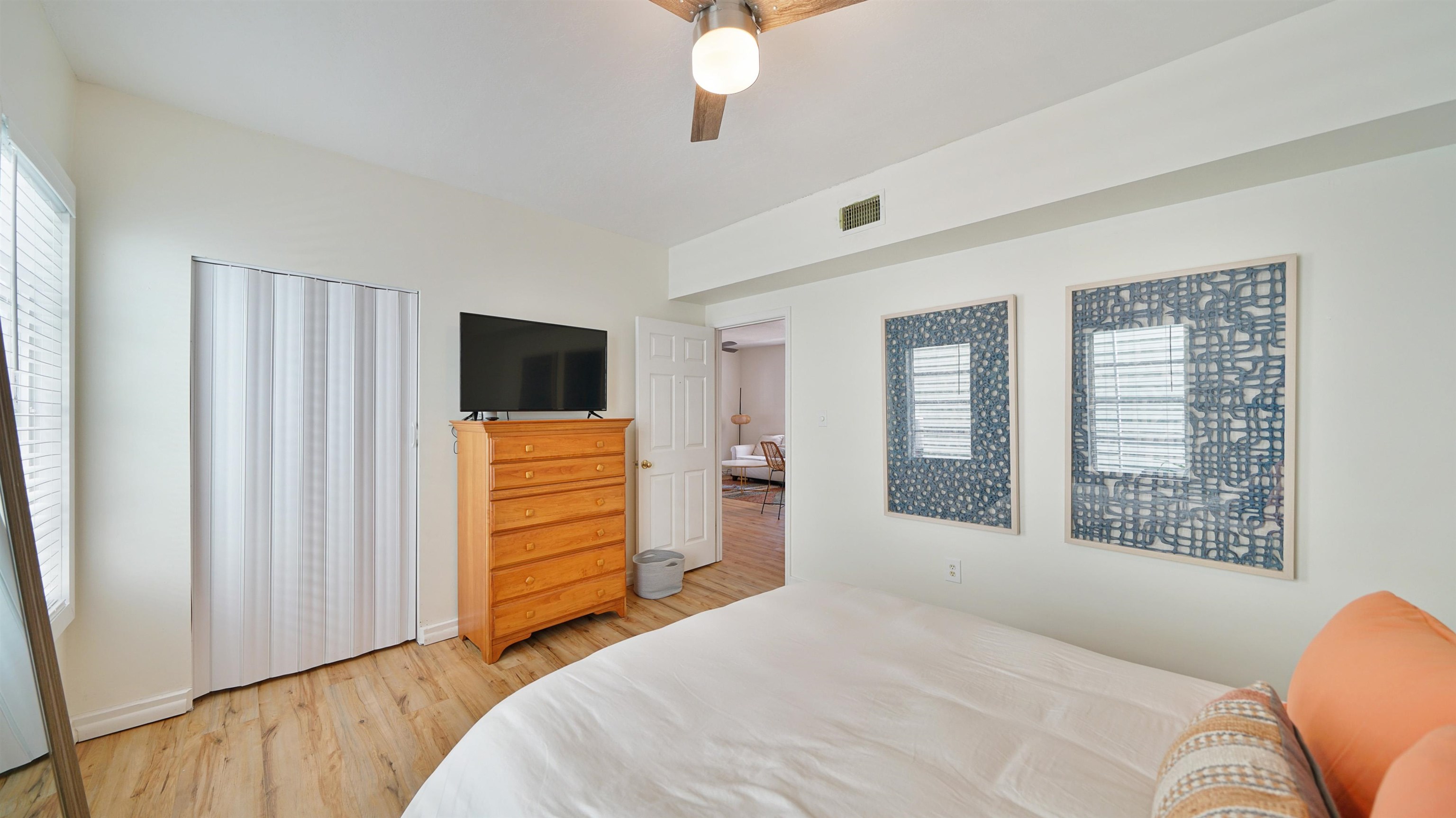 119 Moore Street St. Augustine, FL 32084 - Photo 16 of 49 a bedroom with a bed and a flat tv screen