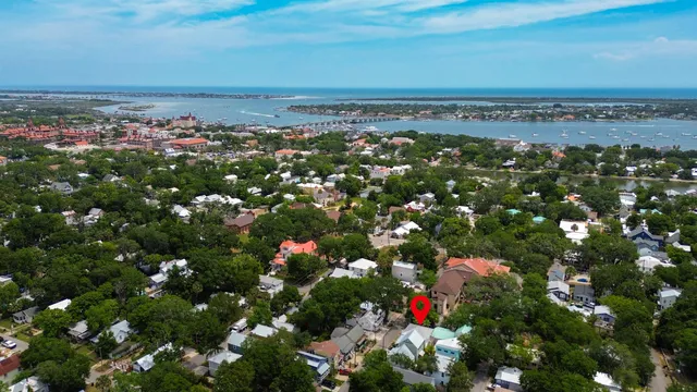a view of a two chairs in the balcony