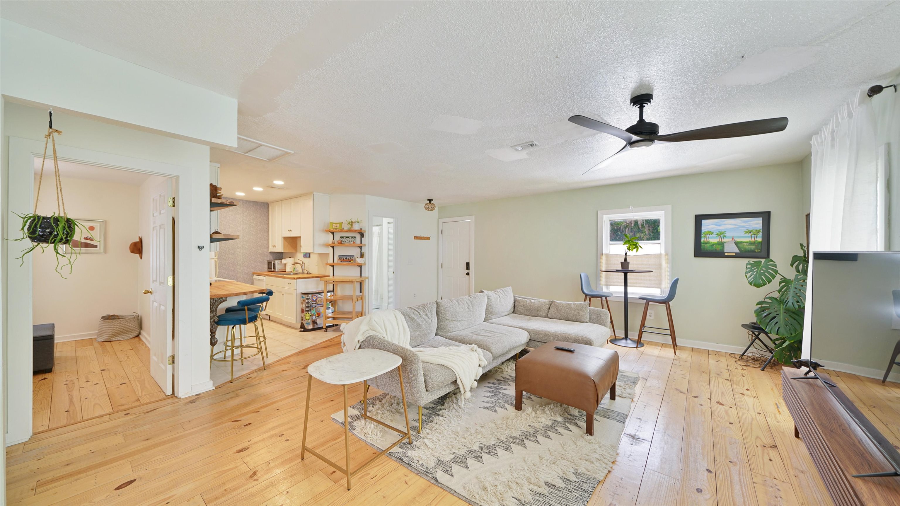119 Moore Street St. Augustine, FL 32084 - Photo 21 of 49 a living room with furniture and a wooden floor