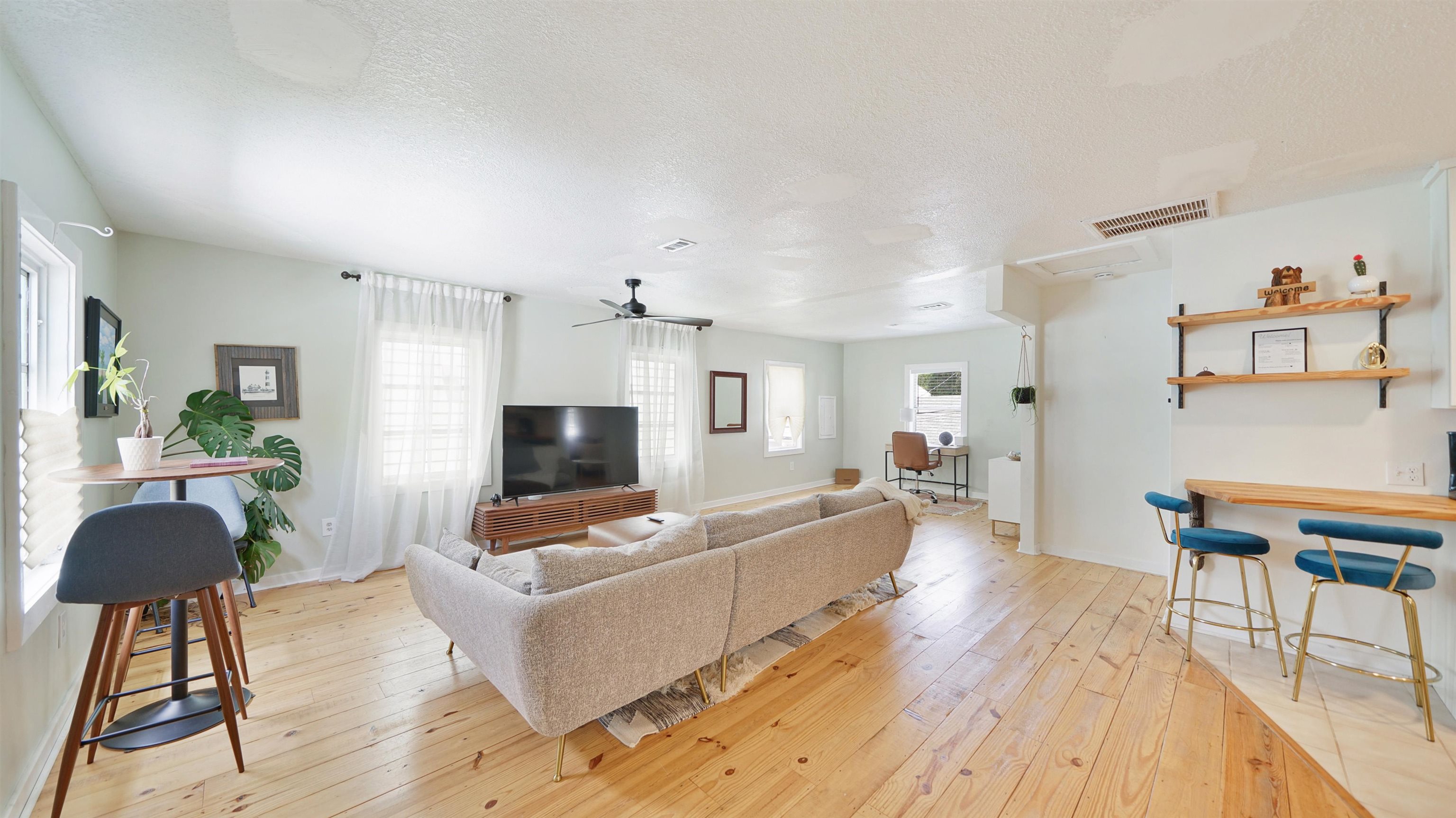 119 Moore Street St. Augustine, FL 32084 - Photo 22 of 49 a living room with furniture and a wooden floor