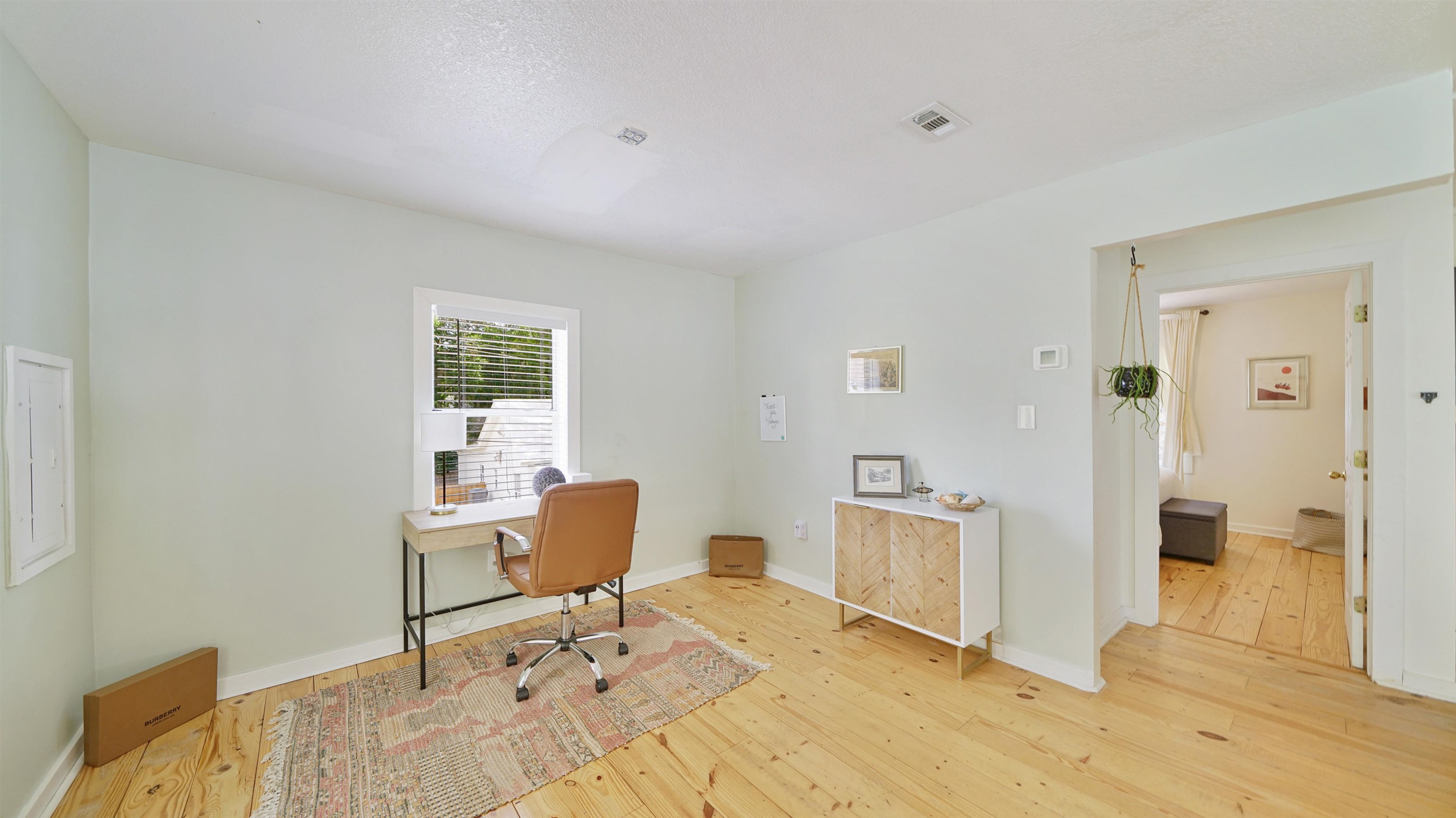 119 Moore Street St. Augustine, FL 32084 - Photo 24 of 49 a room with furniture and a window