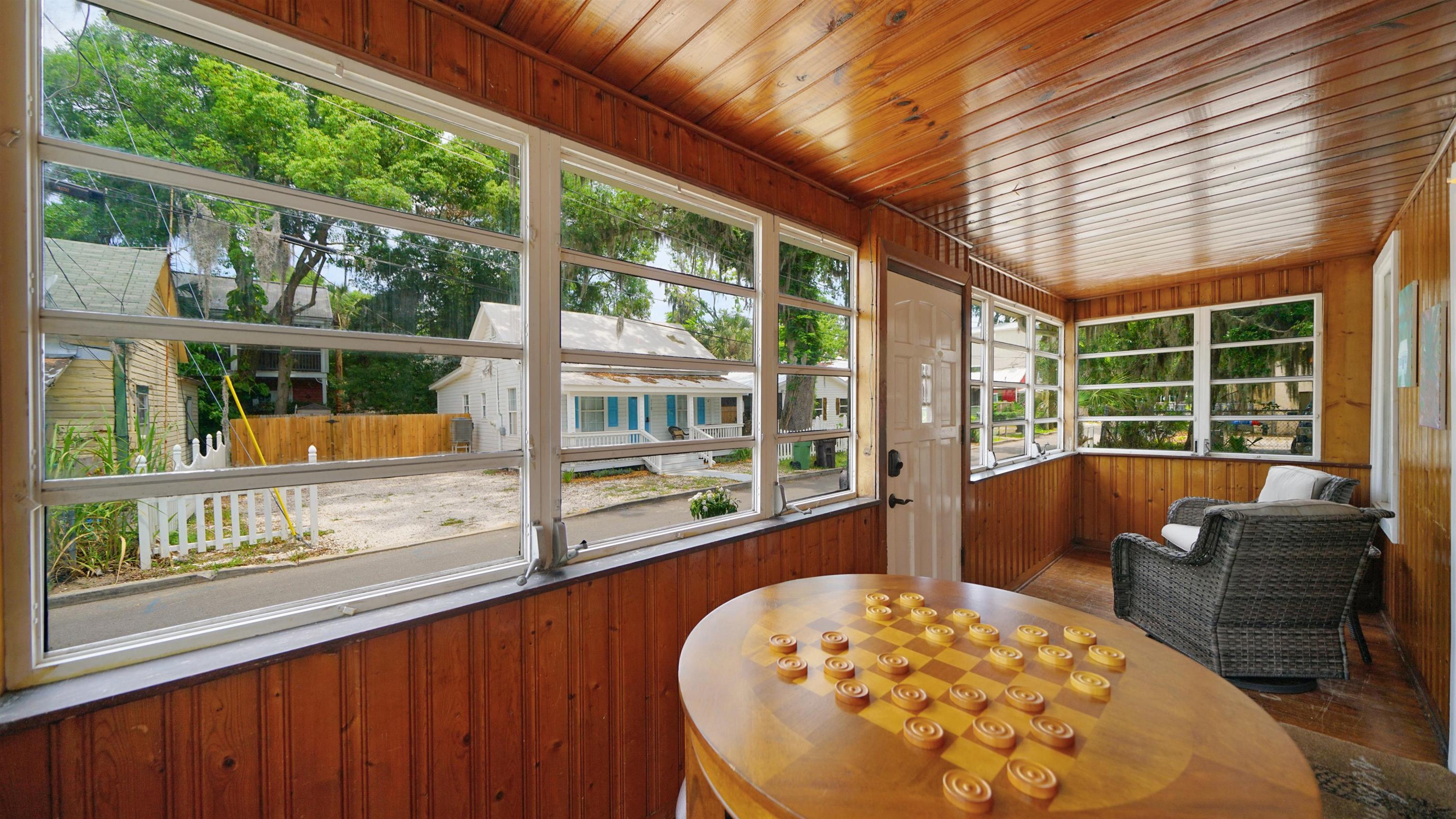 119 Moore Street St. Augustine, FL 32084 - Photo 3 of 49 a view of a two chairs in the balcony