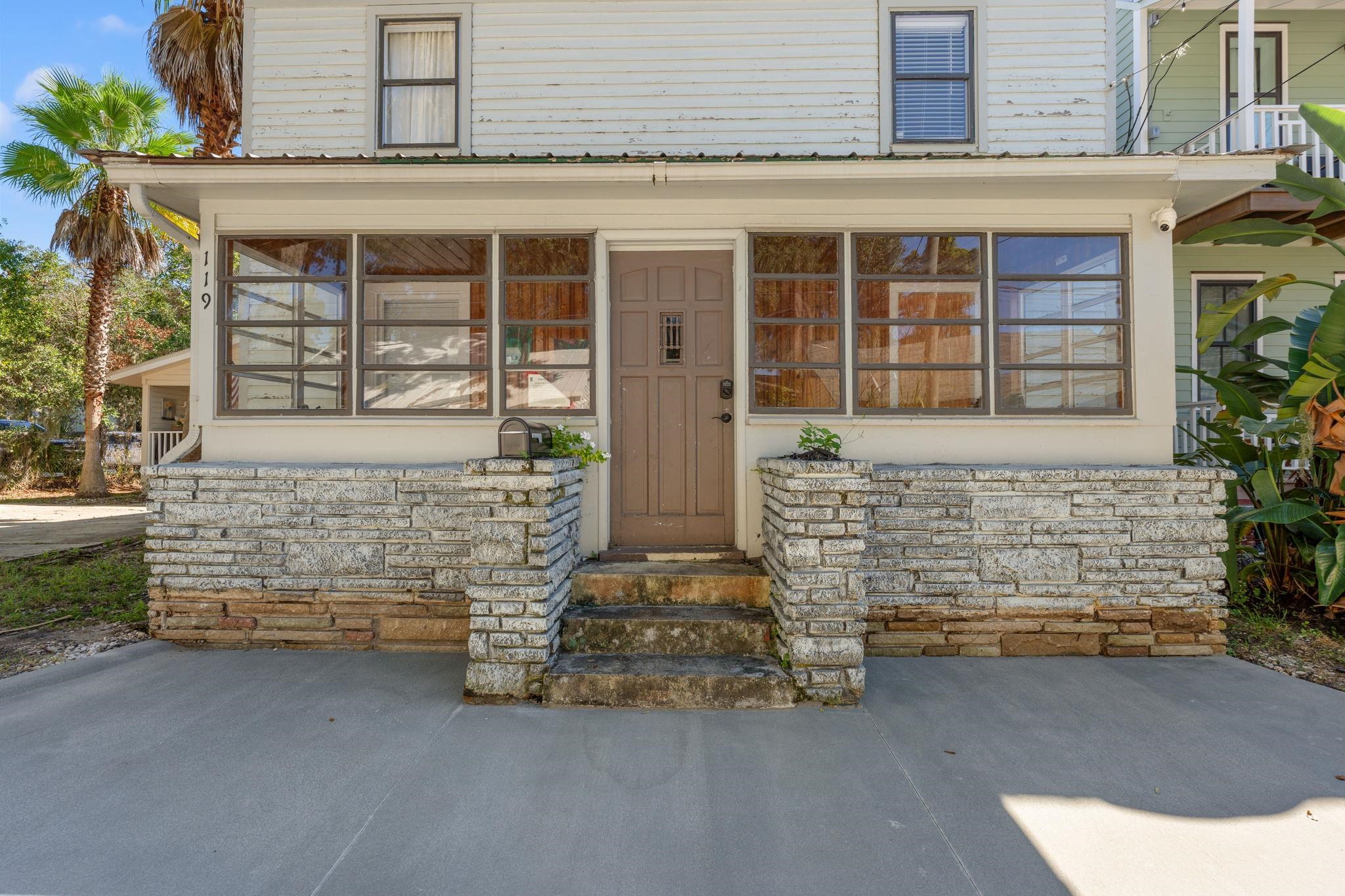 119 Moore Street St. Augustine, FL 32084 - Photo 40 of 49 front view of a house with a garage