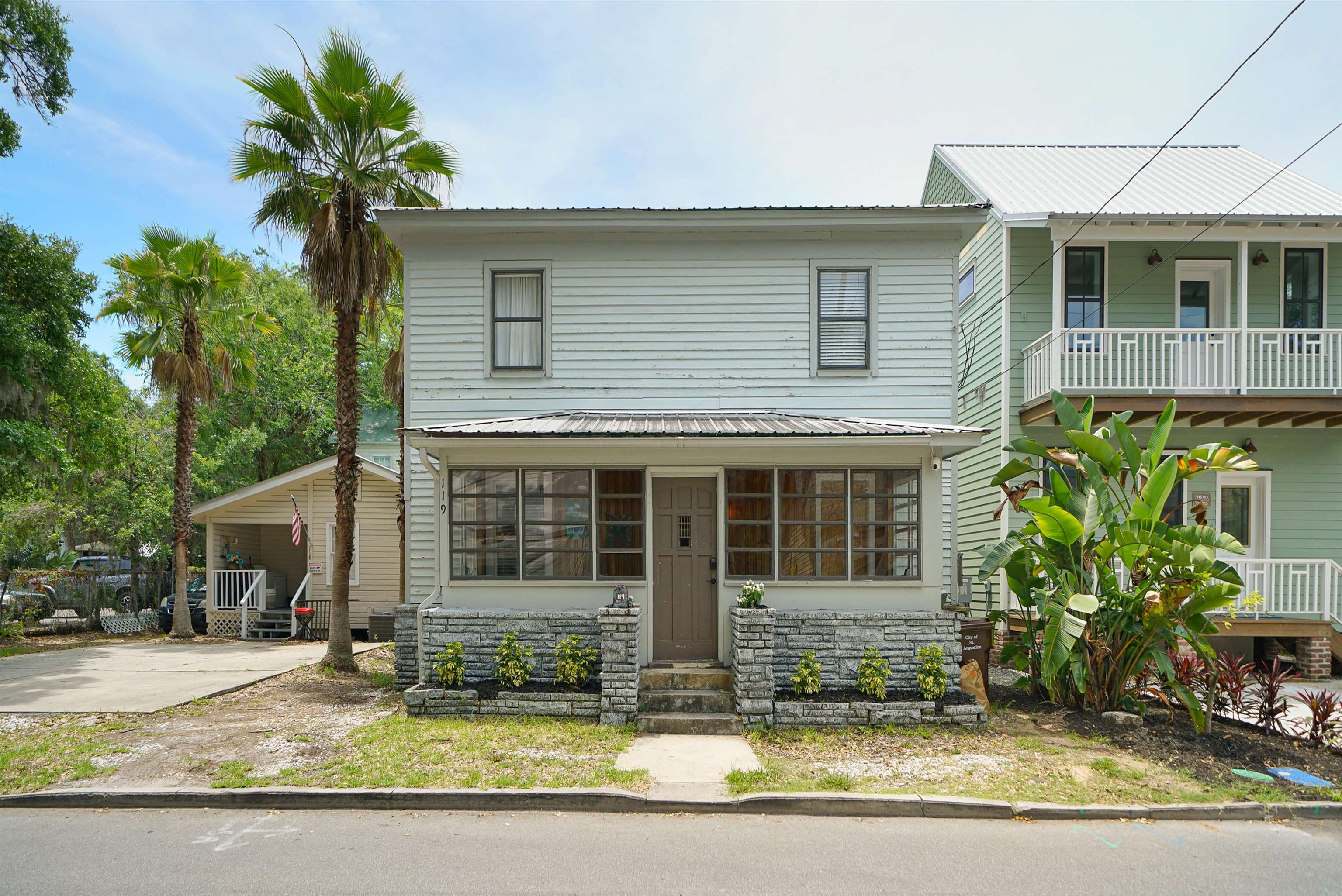 119 Moore Street St. Augustine, FL 32084 - Photo 44 of 49 a front view of a house with garden